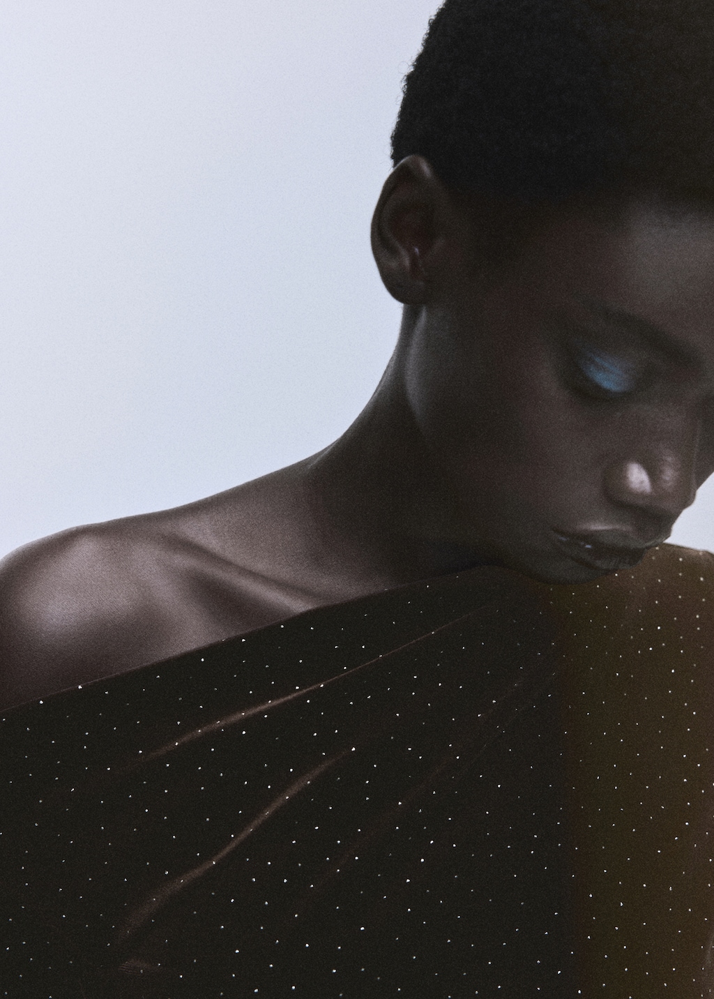 Asymmetrical velvet dress with shiny details