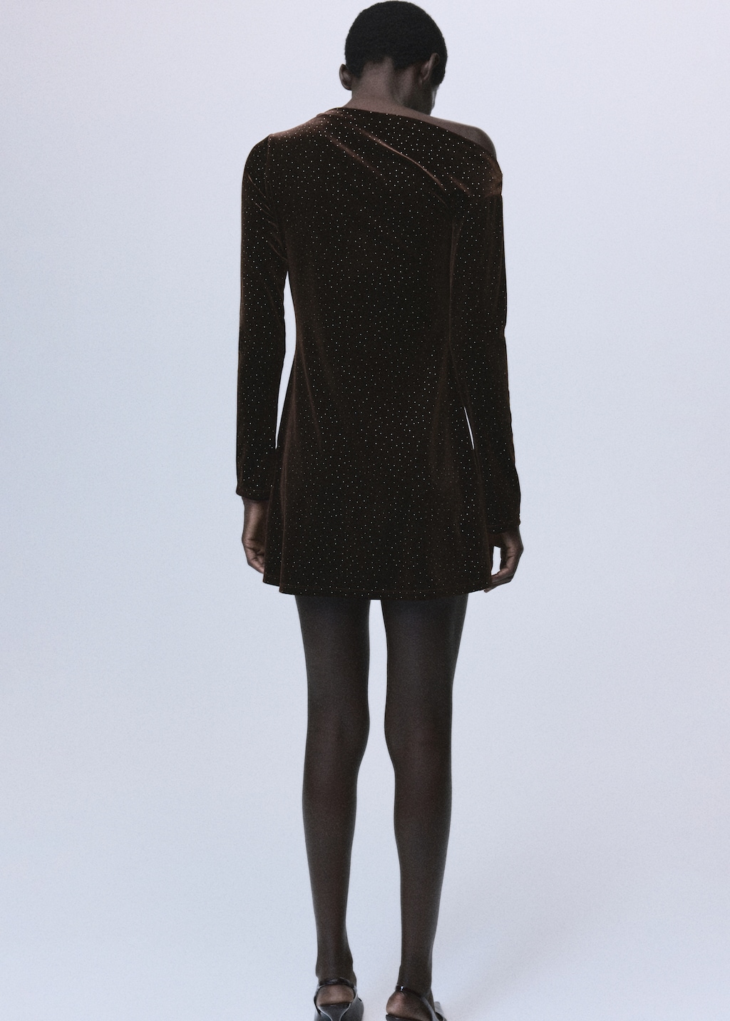 Asymmetrical velvet dress with shiny details