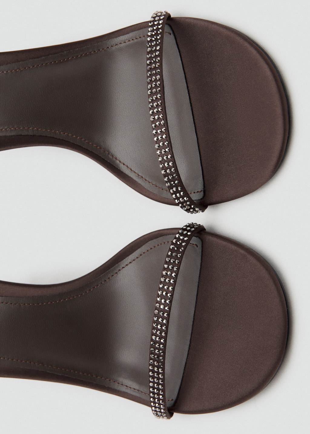 Heeled sandal with strass strap