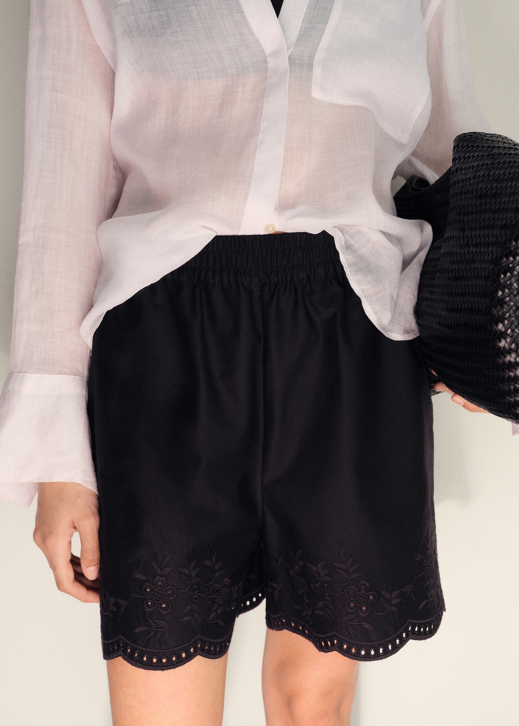 Satin shorts with embroidered hem