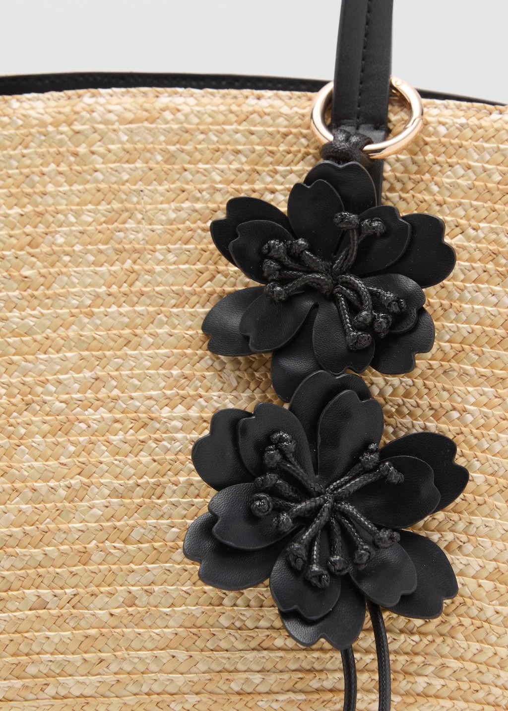 Natural fiber basket with flower charm