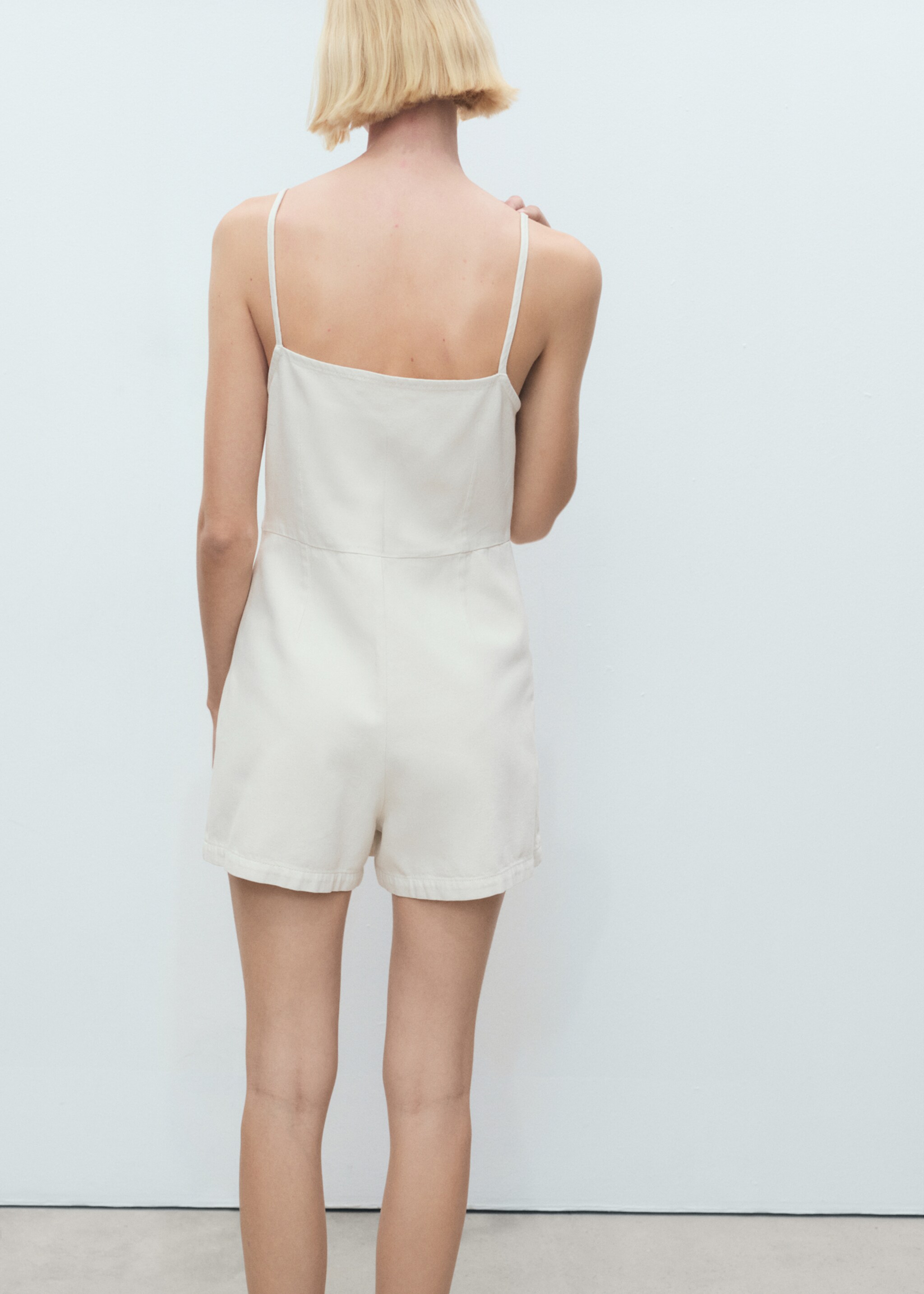 Robe chasuble courte en jean - Verso de l’article
