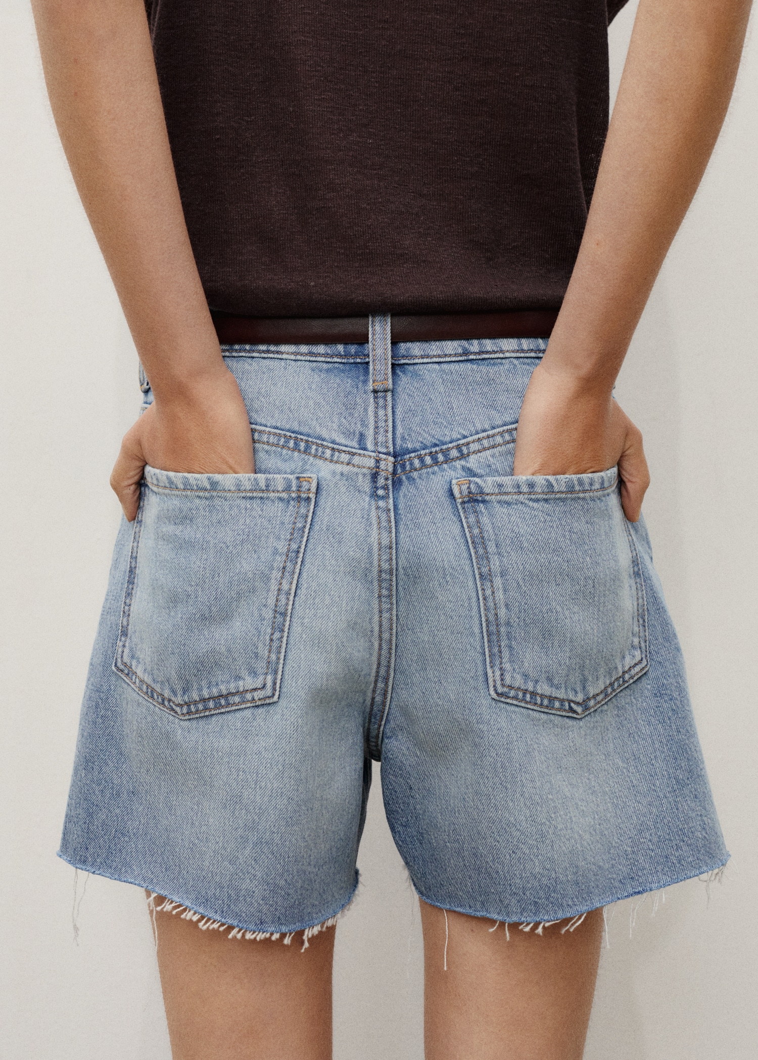 Denim shorts with frayed hem - Main Image