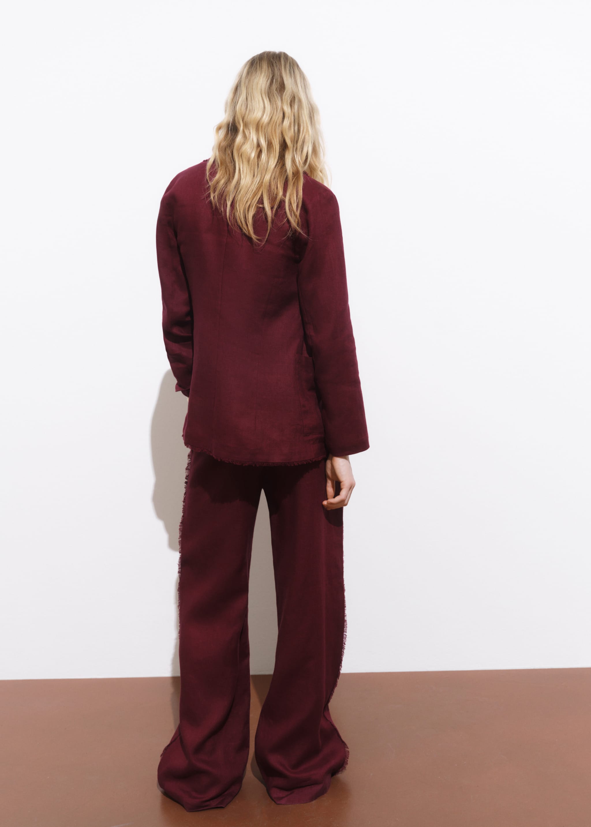 Linen suit trousers with frayed ends - Reverse of the article
