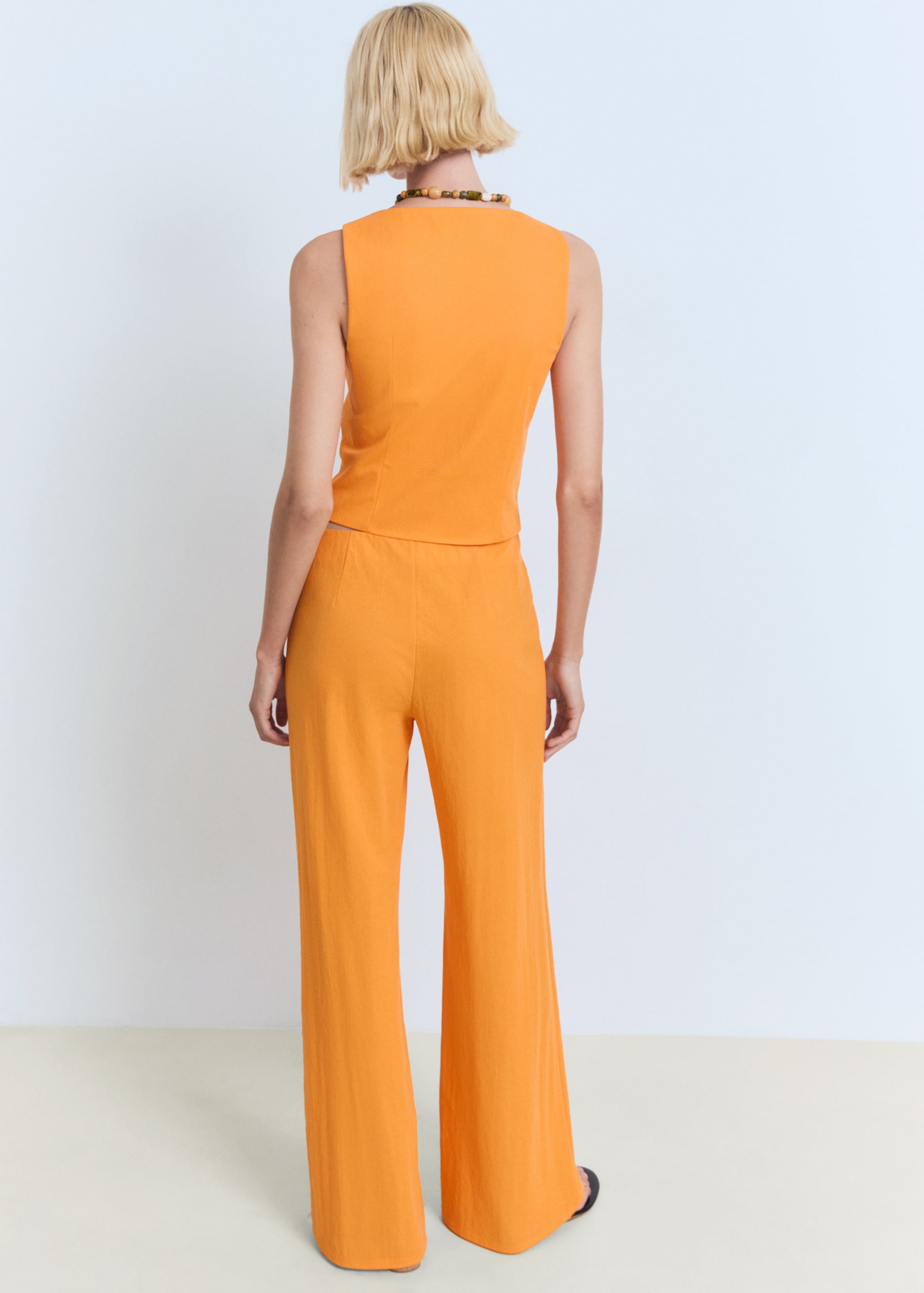 Flowy straight-fit trousers - Reverse of the article