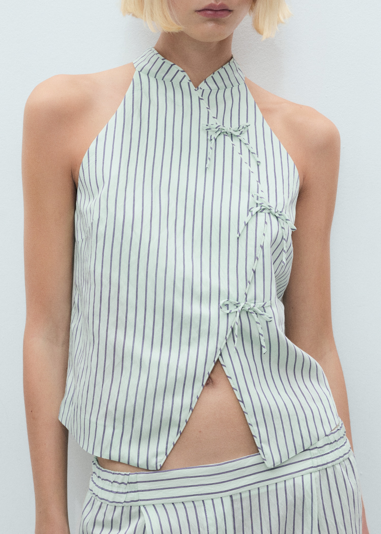 Striped top with a strap neckline and laces Women MANGO USA