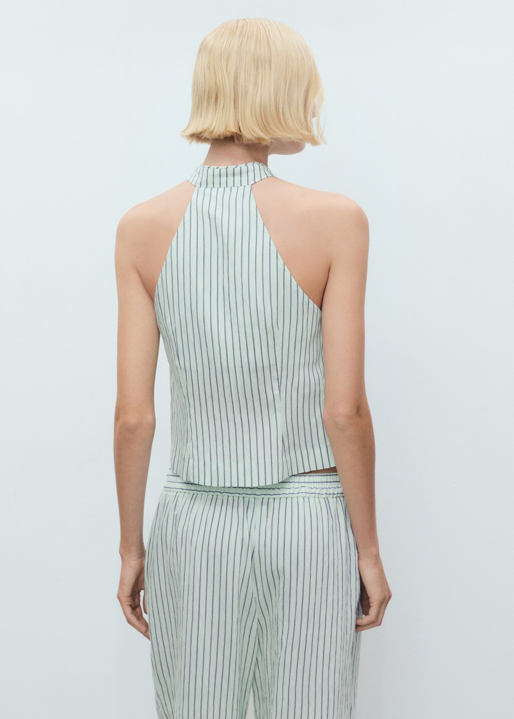 Striped top with a strap neckline and laces