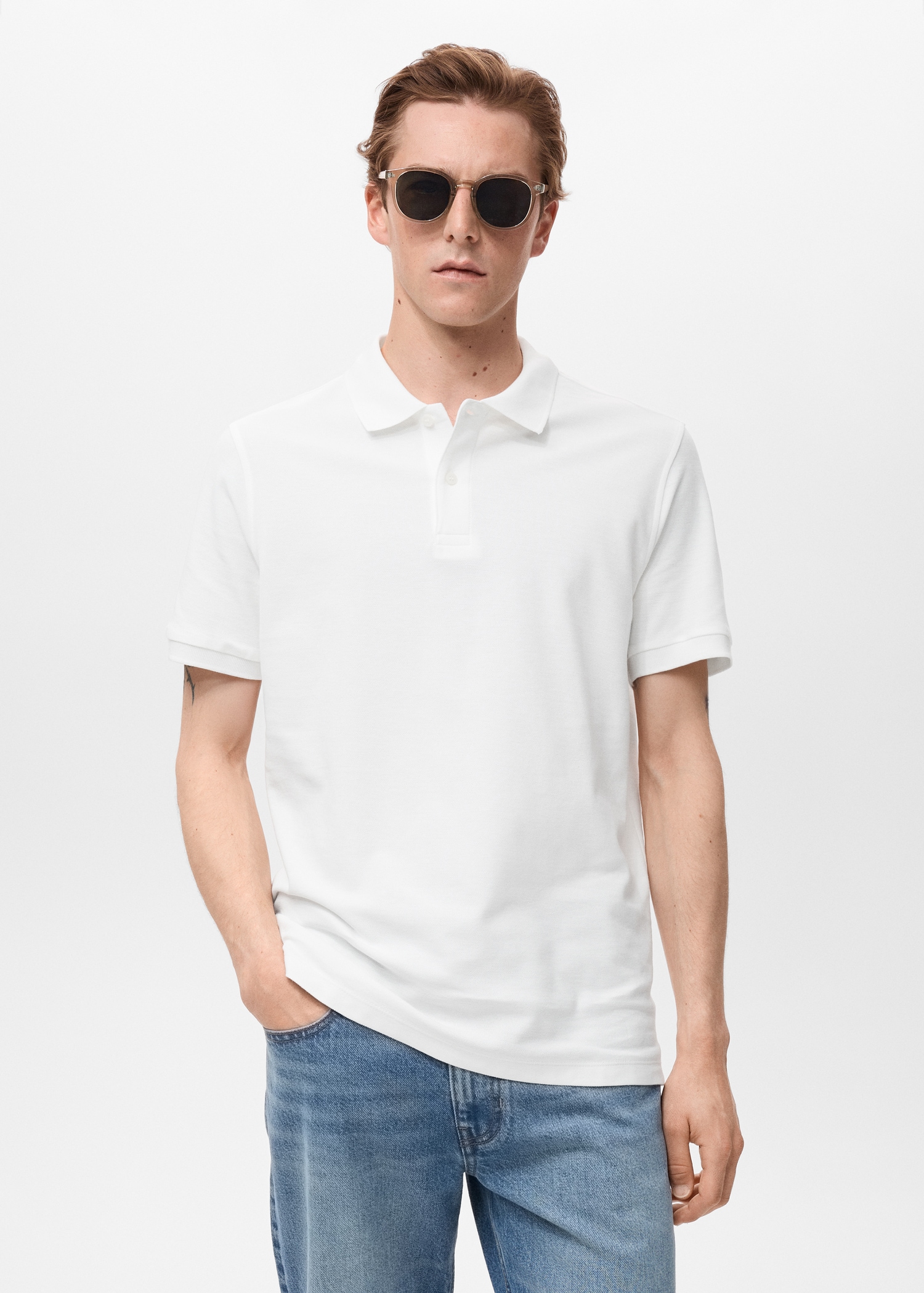 Polo regular fit de piqué de algodão Homem MANGO Portugal