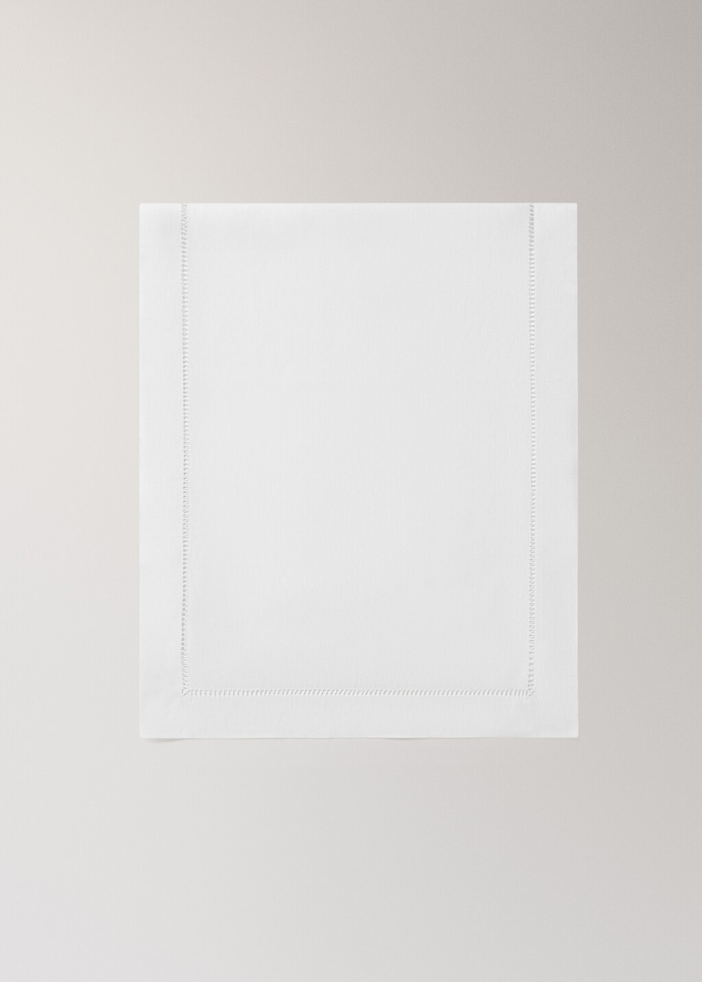 Linen table runner with embroidered hemstitch