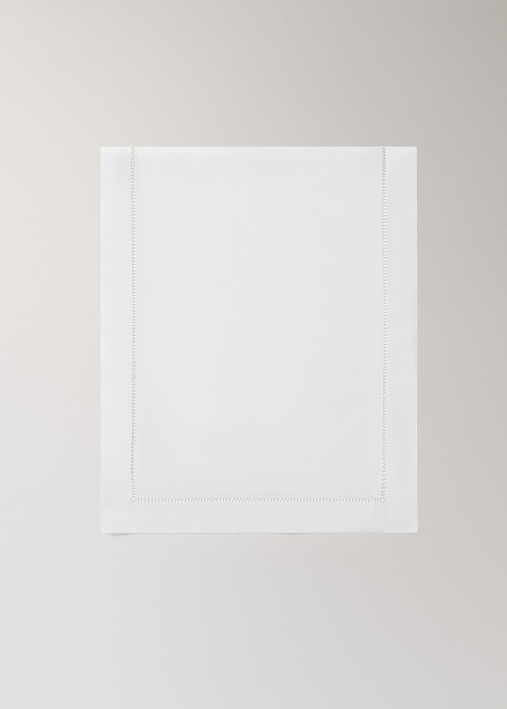 Linen table runner with embroidered hemstitch