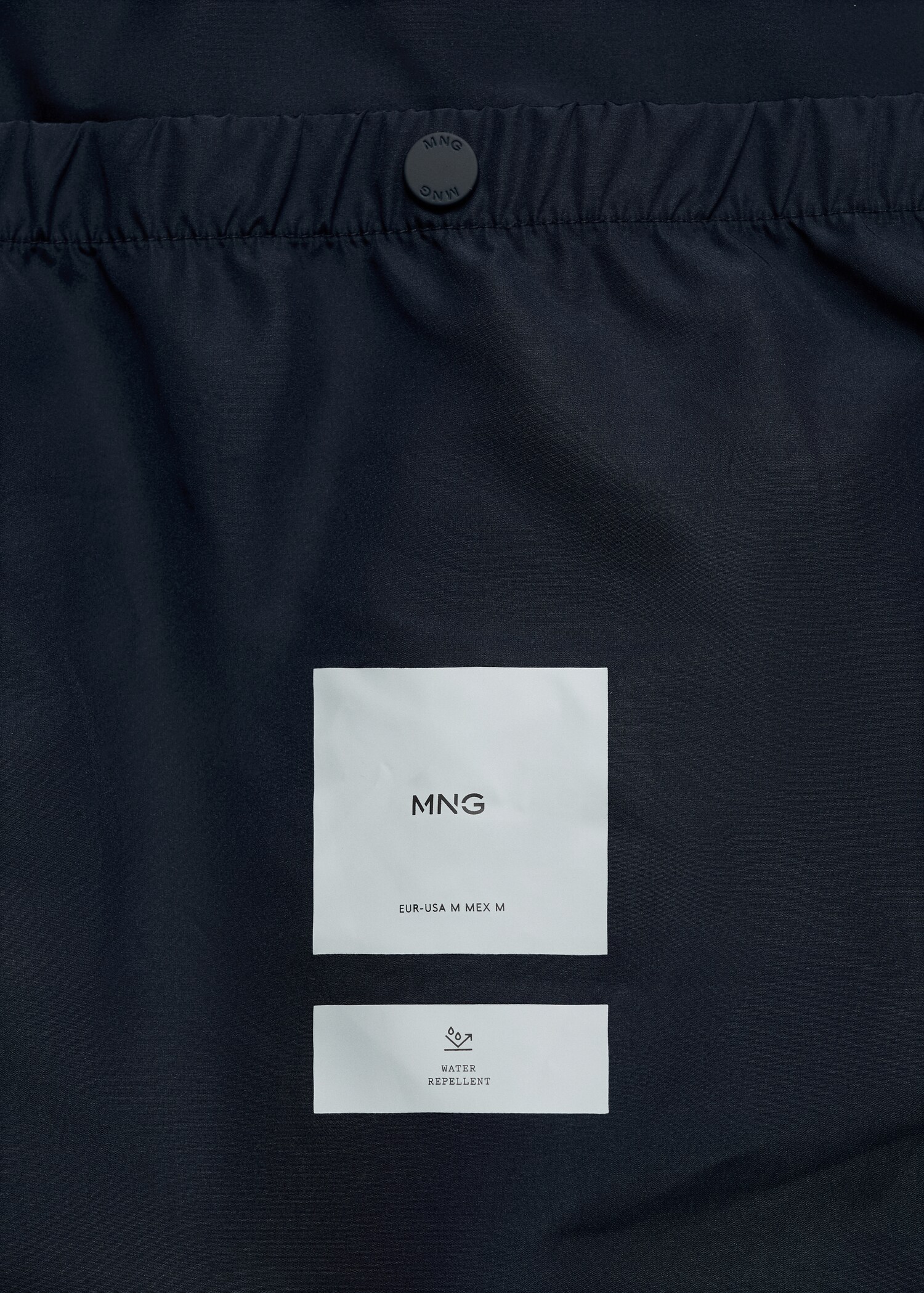 Water-repellent quilted long anorak - Details of the article 0
