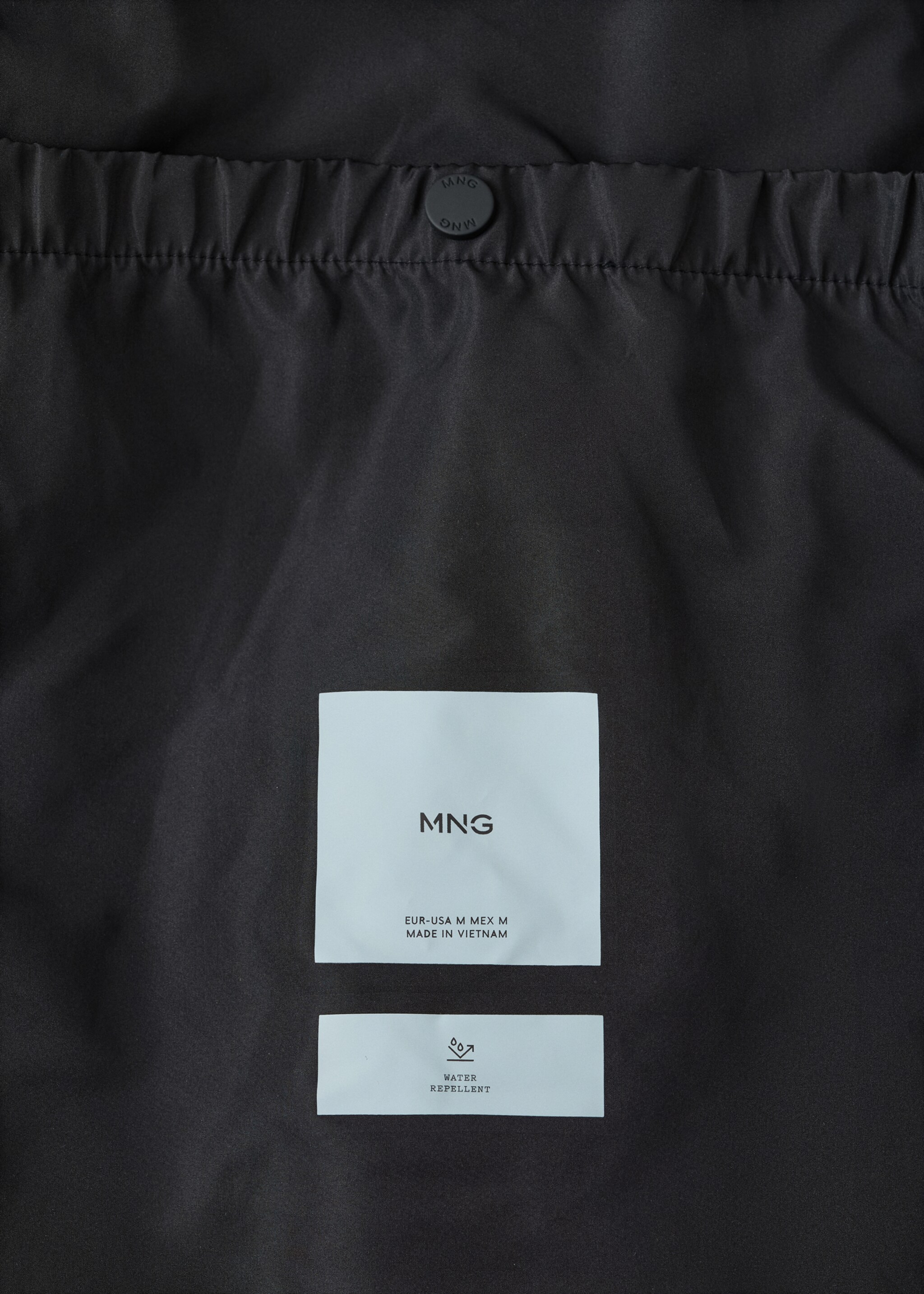 Water-repellent quilted long anorak - Details of the article 0