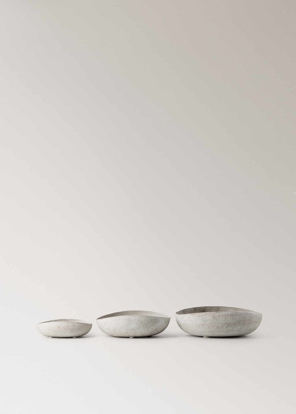 Large textured metal decorative bowl