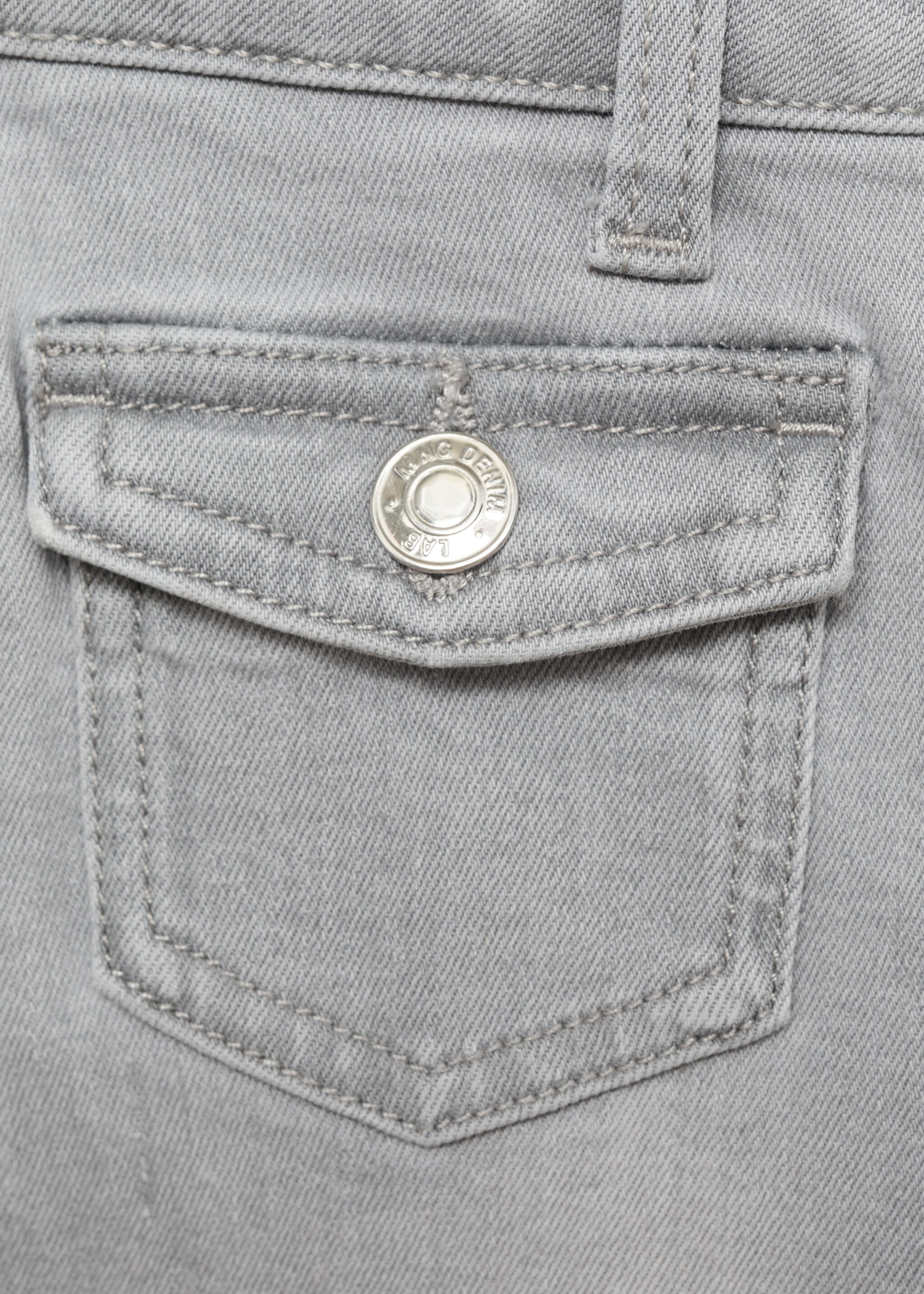 Flared jeans with pocket - Details of the article 0