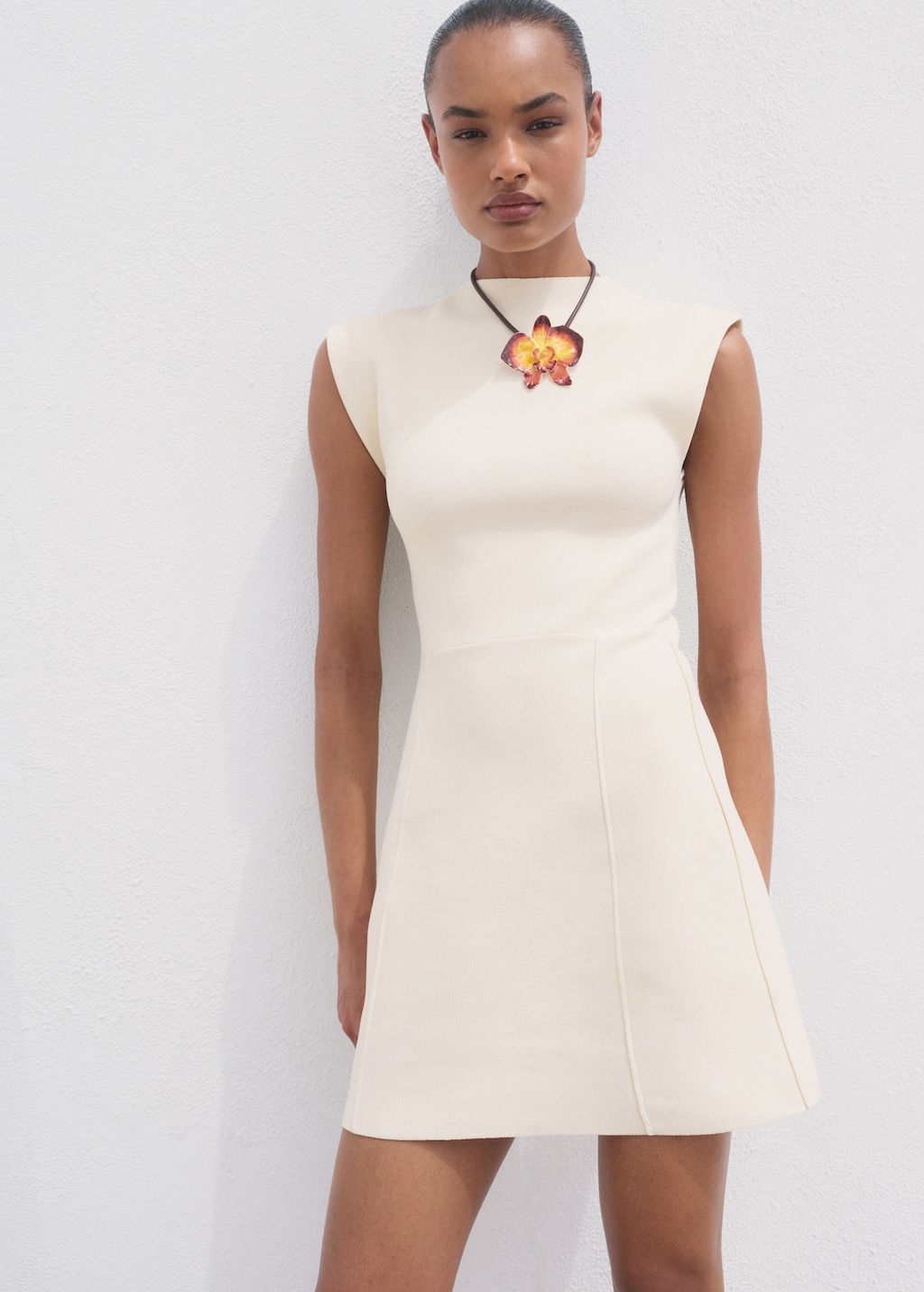 Flared knit dress with perkins collar