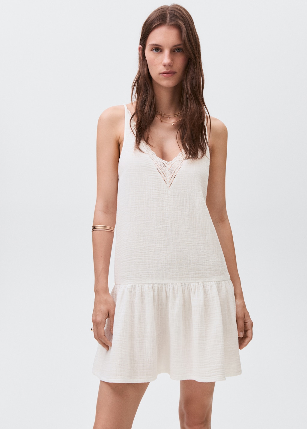 Dress with lace flounces