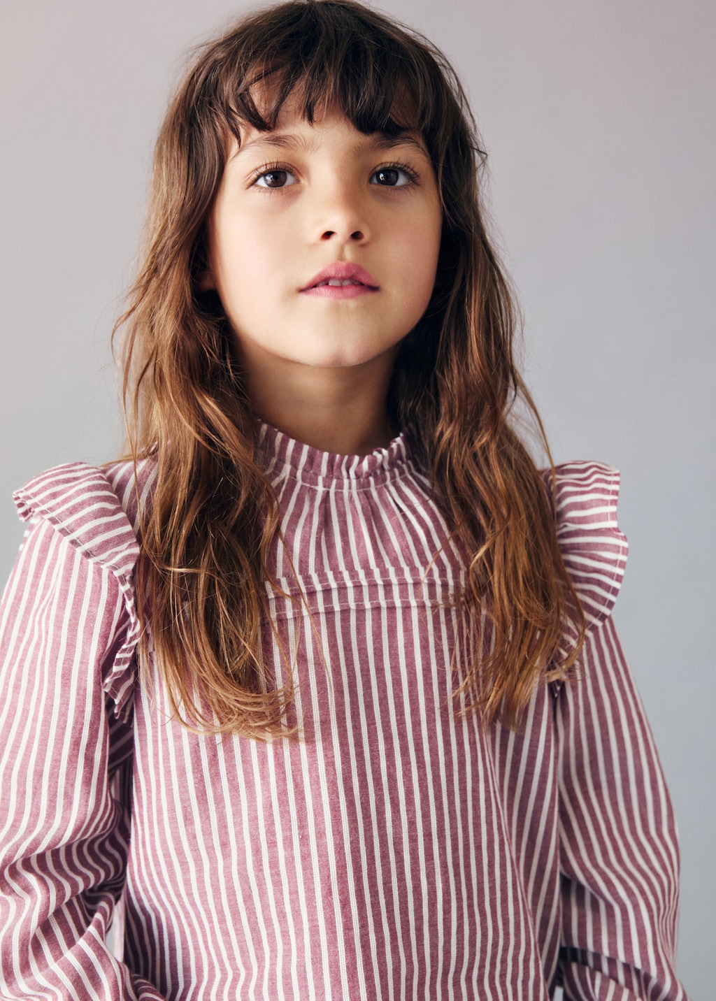 Ruffled stripe-patterned blouse