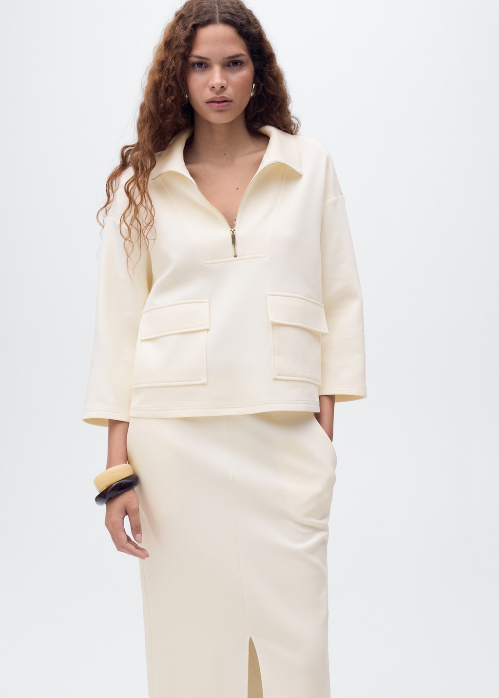 Chaqueta bolsillos manga tres cuartos