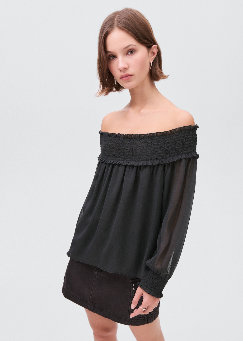 Strapless blouse with ruffled panel