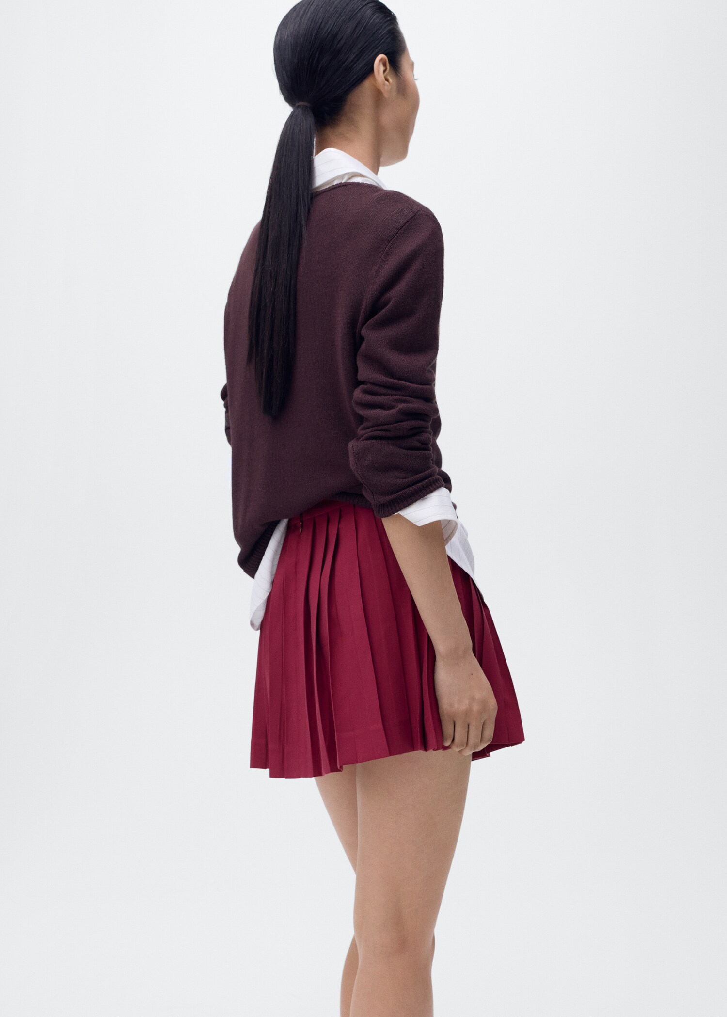 Pleated skirt with buckles - Reverse of the article