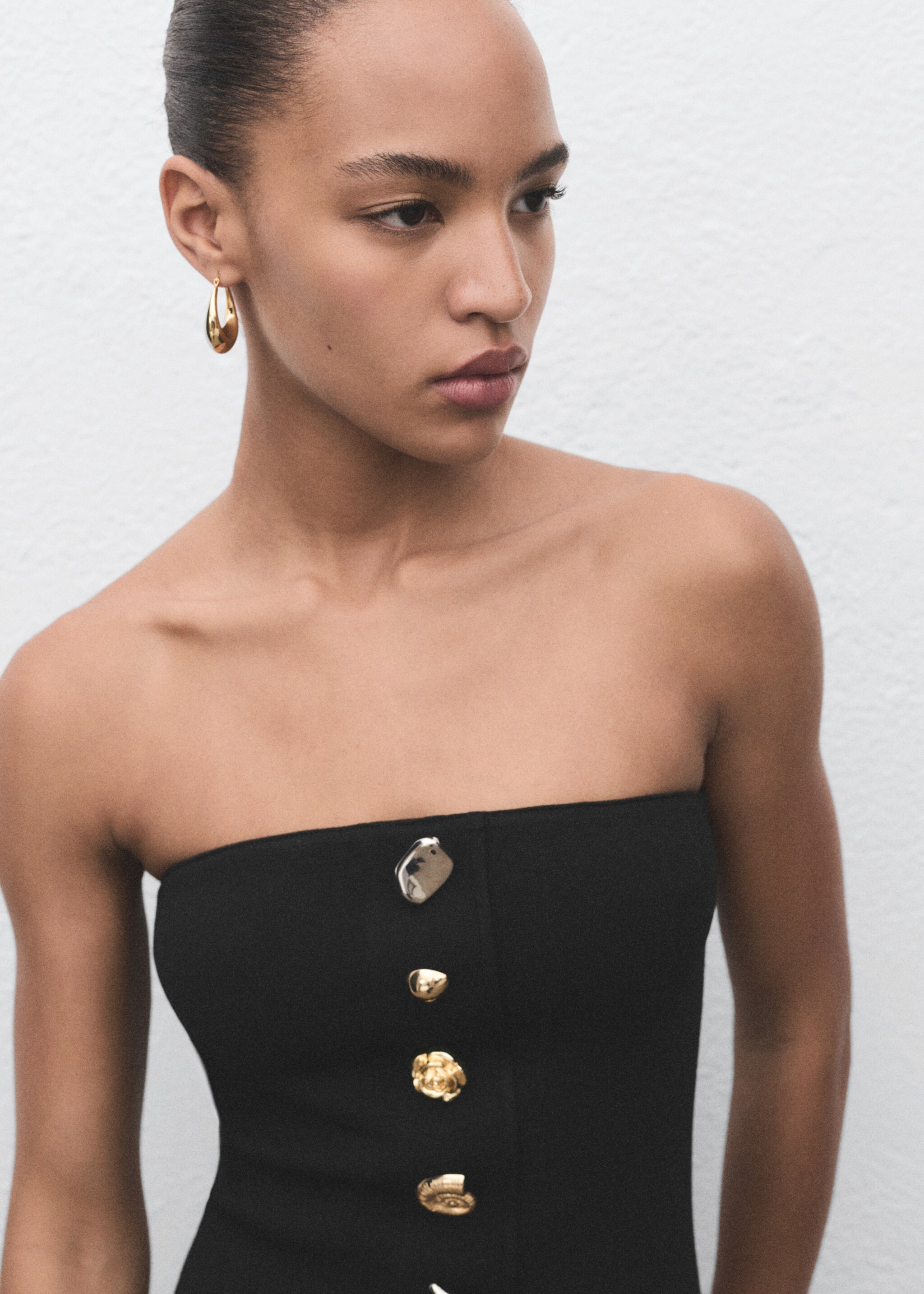 Strapless dress with jewel buttons - Details of the article 1, Black. Ref: 17054139-00.