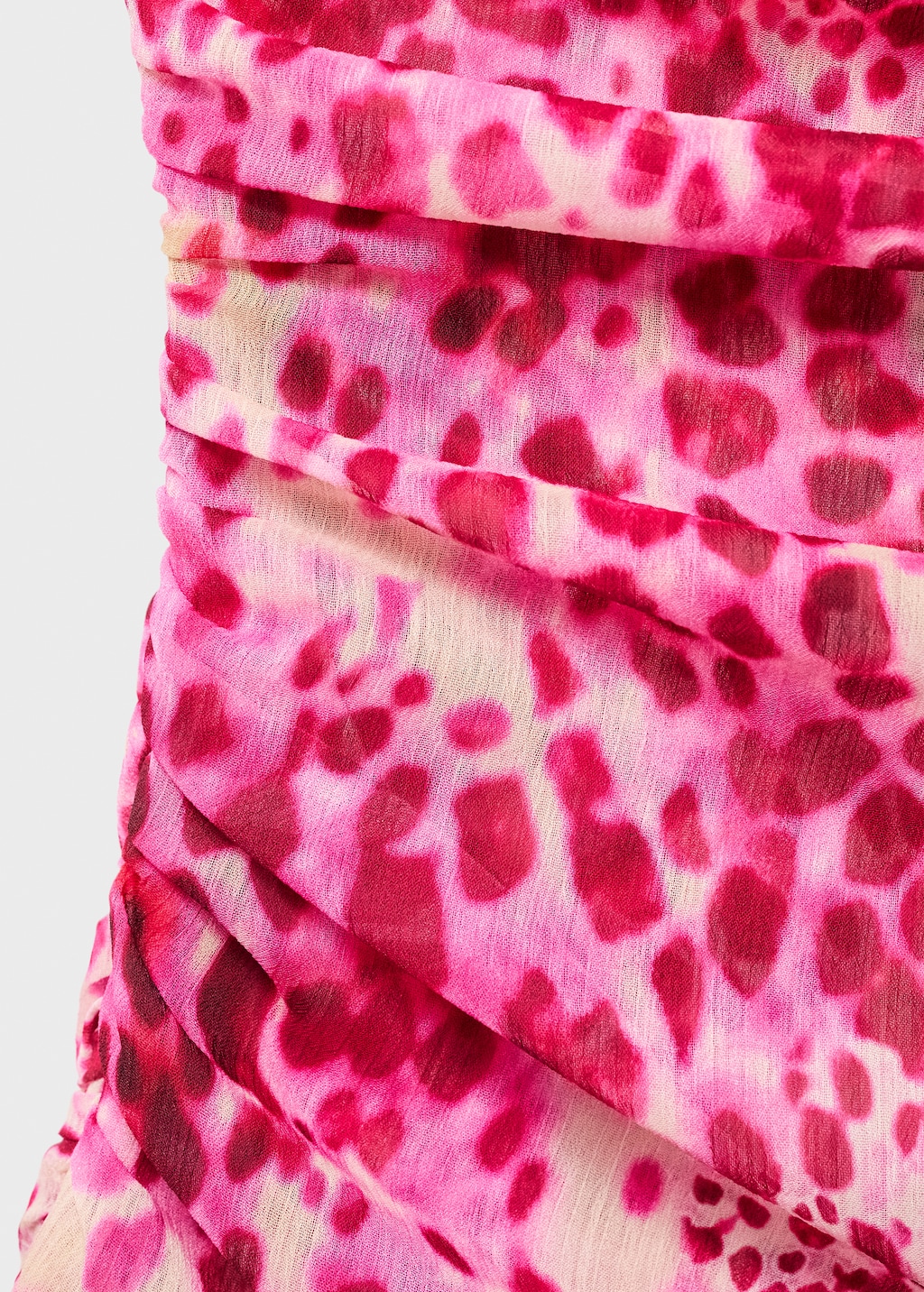 Asymmetric printed top