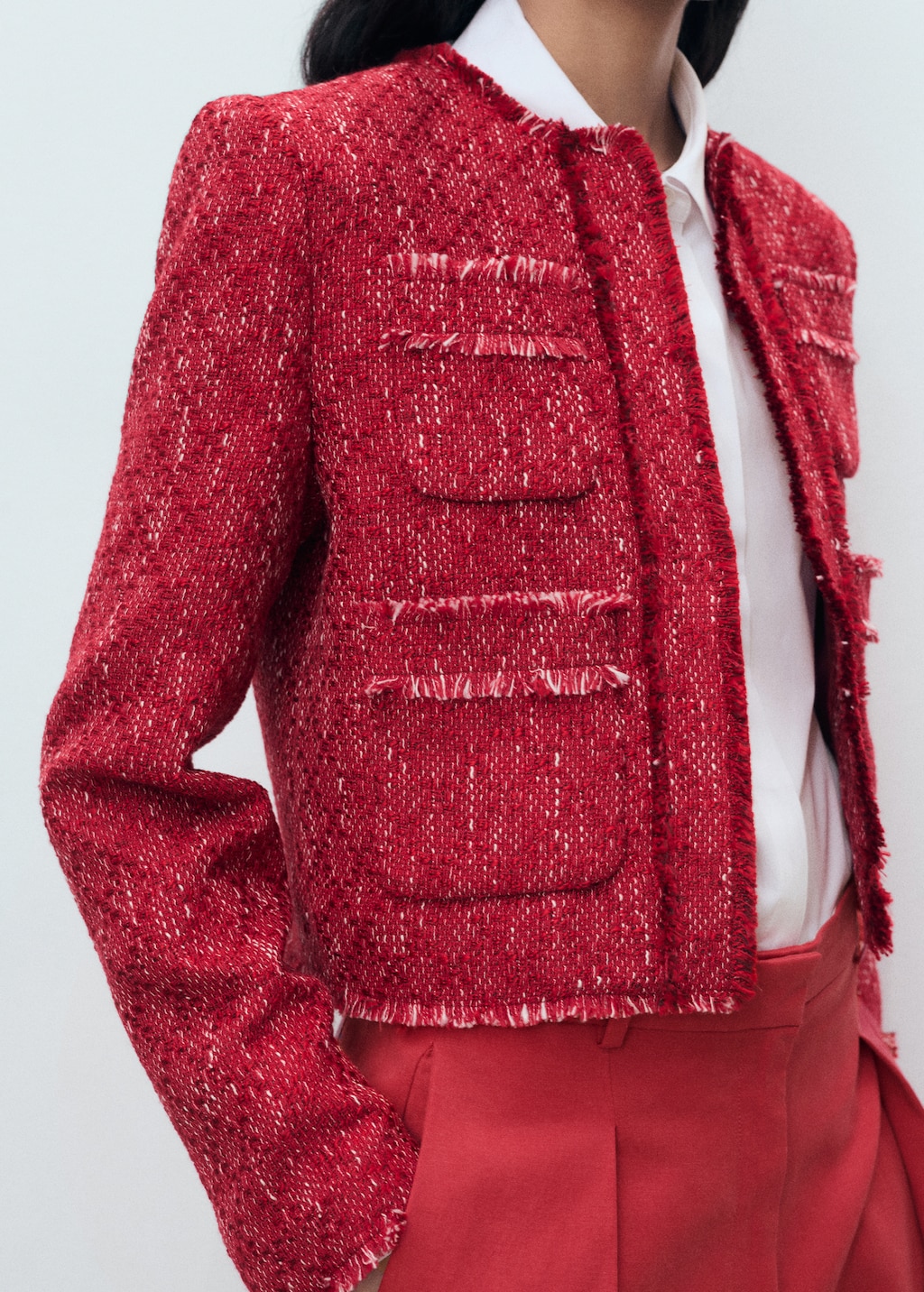 Tweed jacket with frayed ends