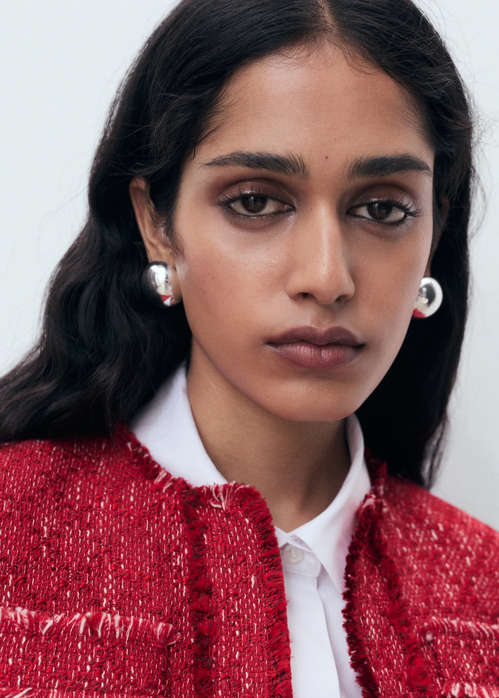 Tweed jacket with frayed ends