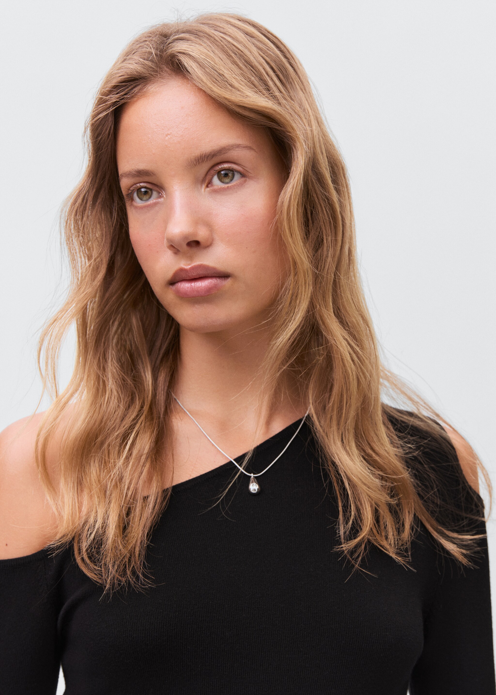 Asymmetrical dress with cut-out - Details of the article 1, Black. Ref: 17054777-00.