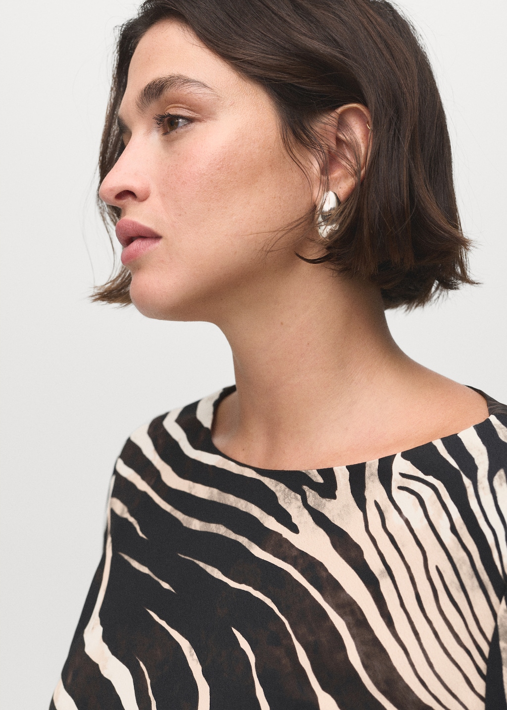 Zebra-print dress with flared sleeves