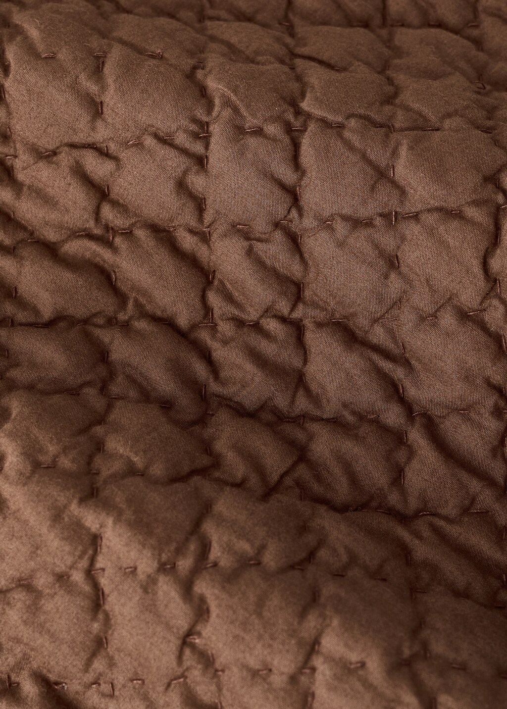 Hand-stitched cotton bedspread for mini-cot