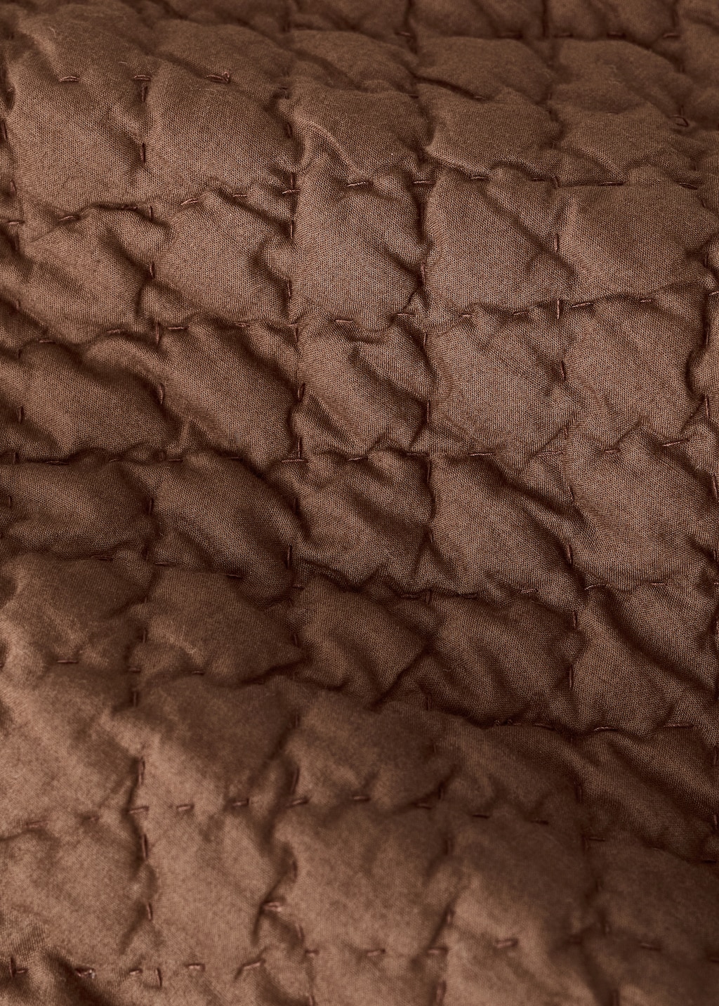 Hand-stitched cotton bedspread for mini-cot