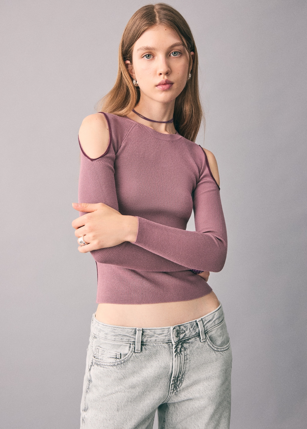 Knitted sweater with cut-out