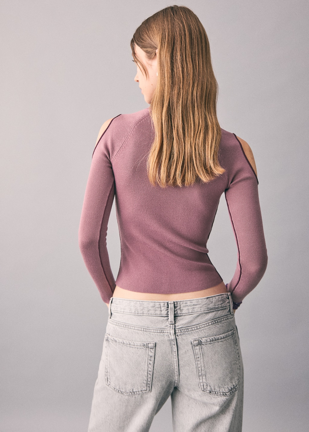 Knitted sweater with cut-out