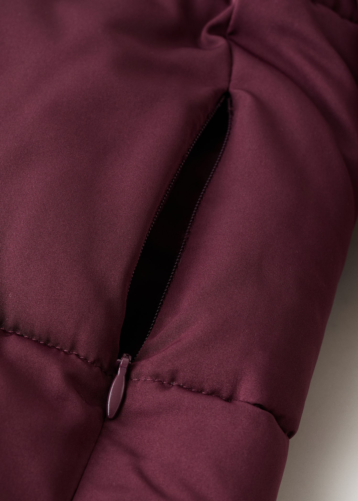 Long padded anorak with hood - Details of the article 8