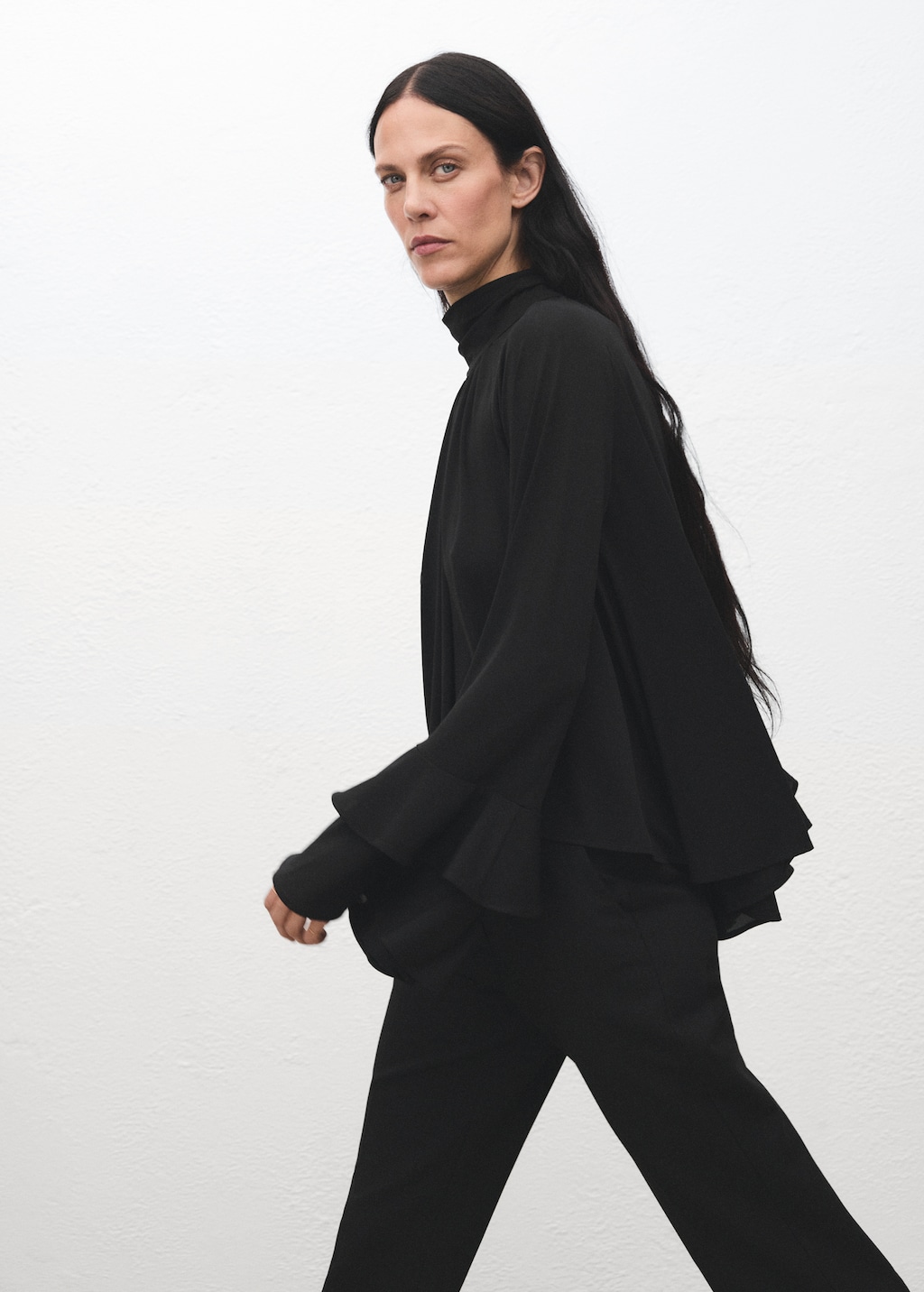 Blouse with flared sleeves and ruffles