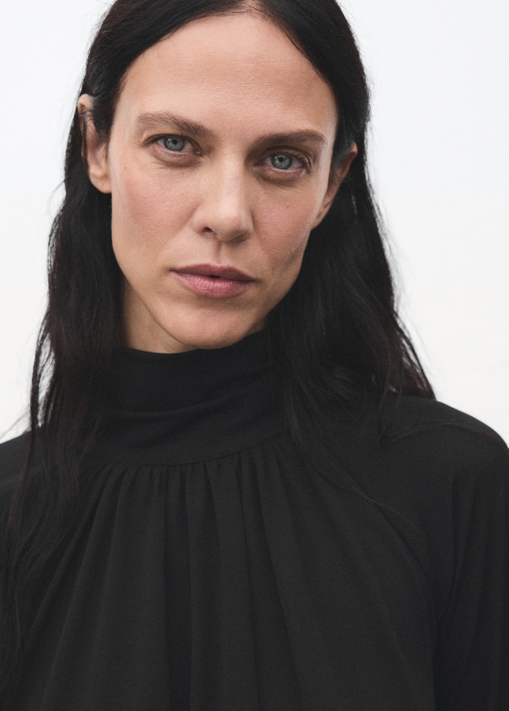 Blouse with flared sleeves and ruffles