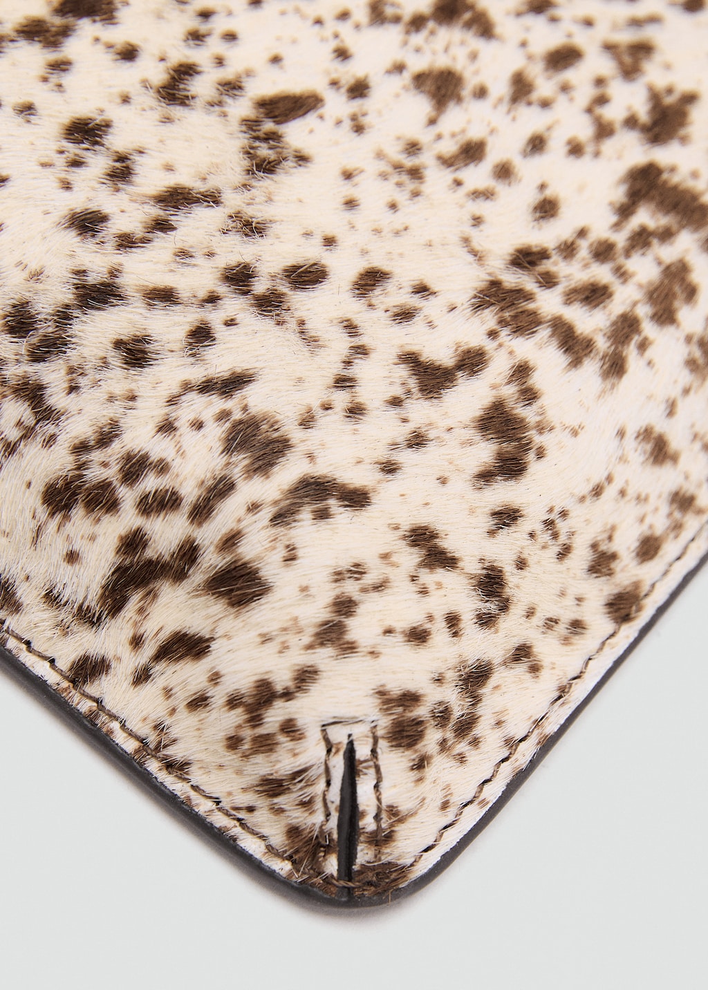 Leather and fur clutch