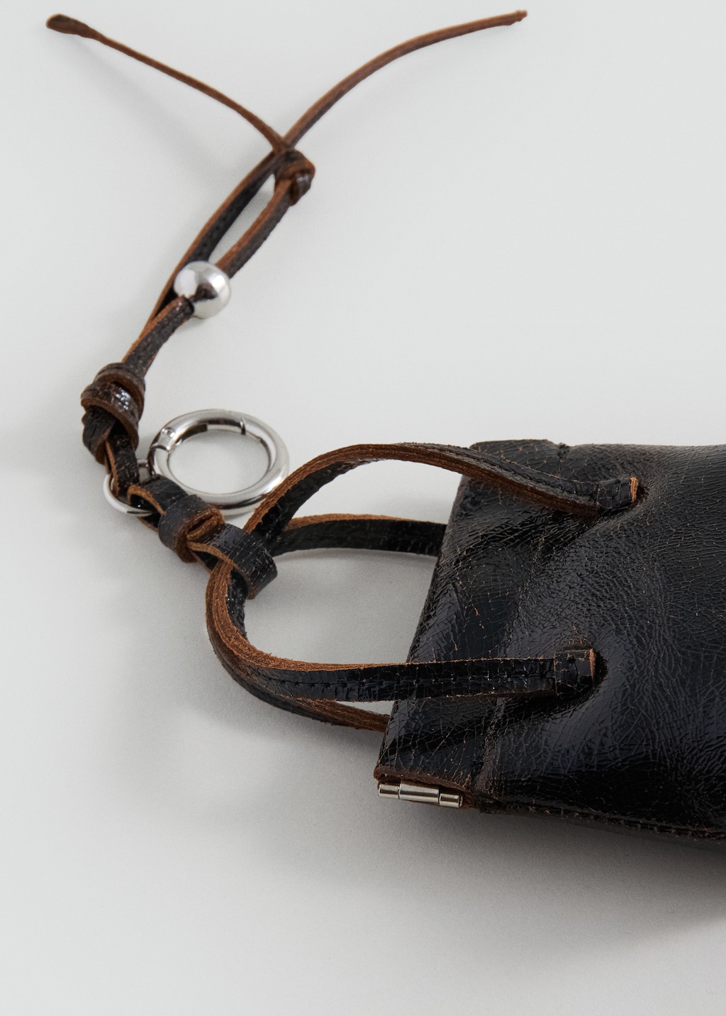 Leather handbag with keychain