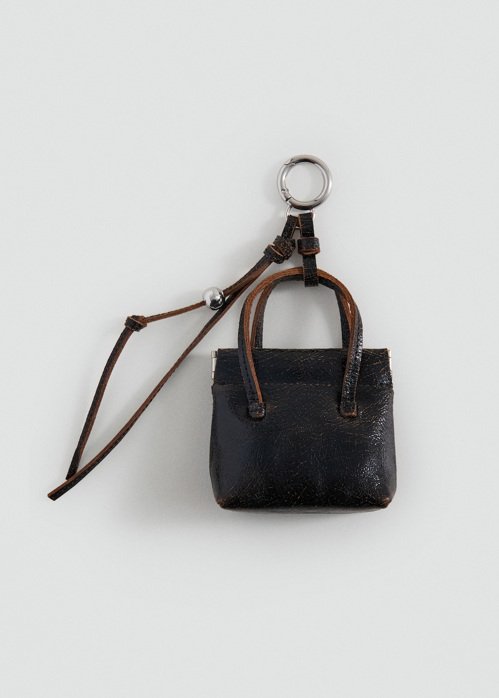 Leather handbag with keychain