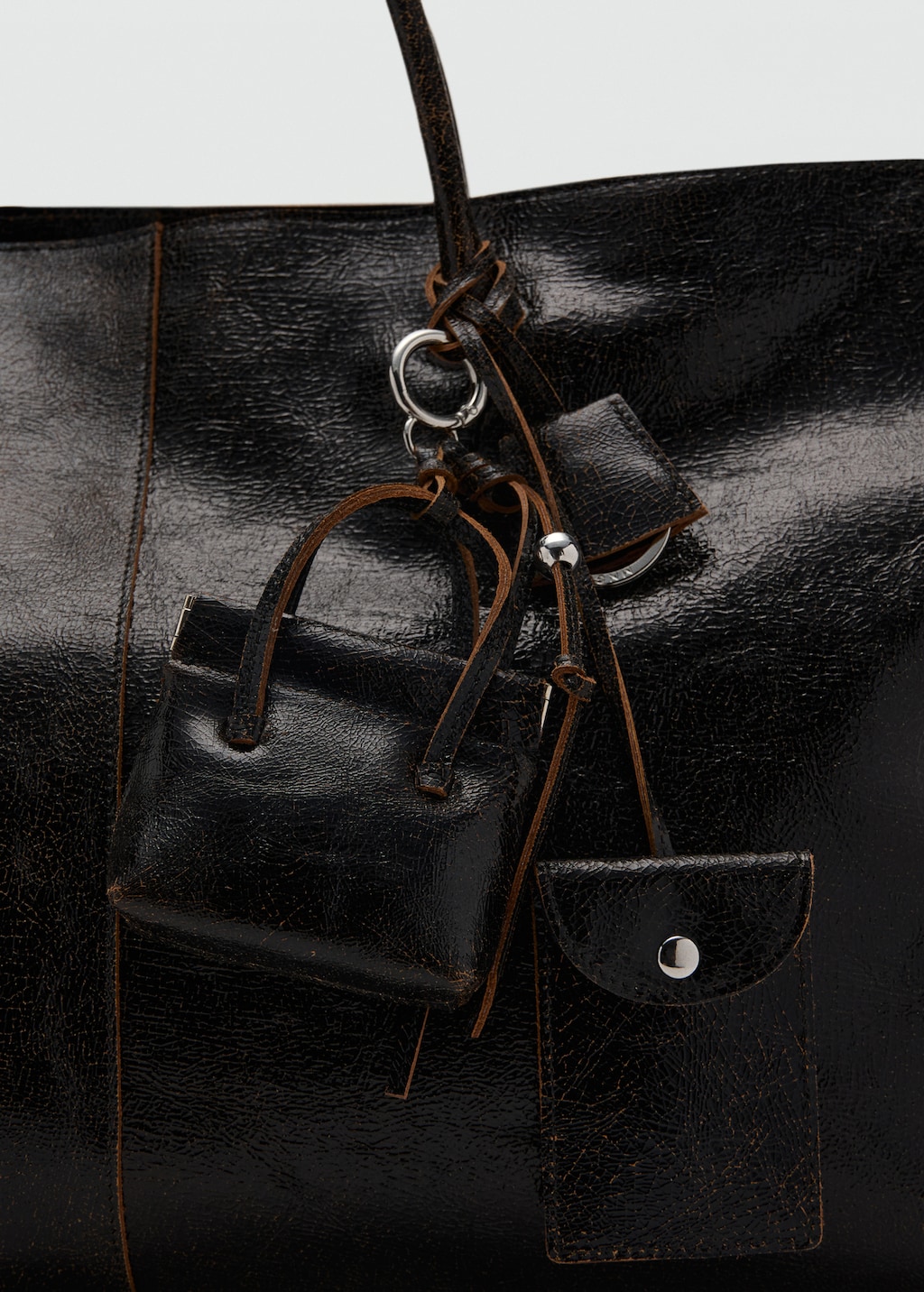 Leather handbag with keychain