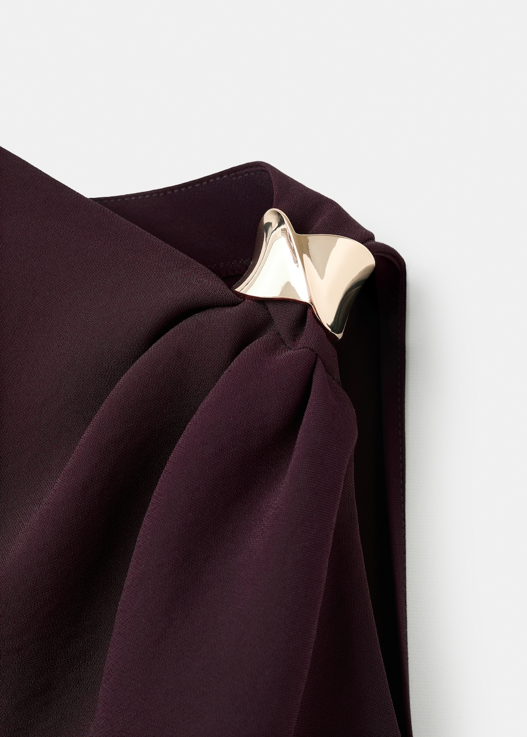 Asymmetrical blouse with metallic detail