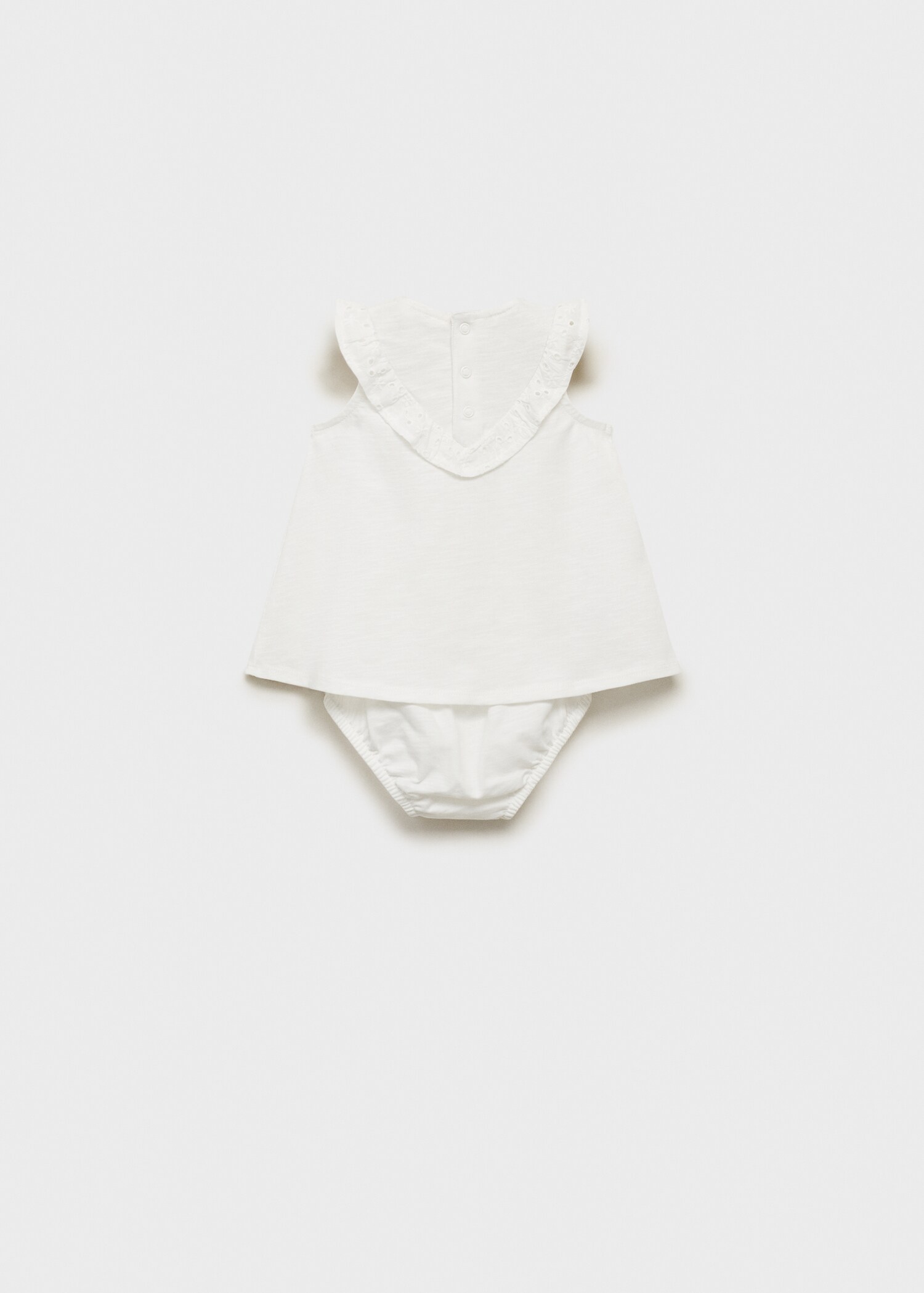 Ruffled dress and frog - Reverse of the article