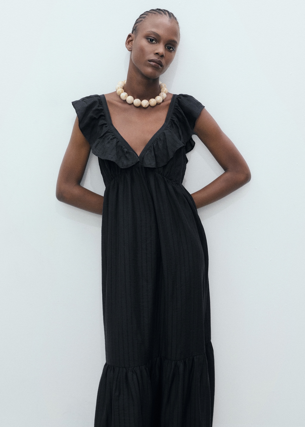 Long dress with ruffle neckline