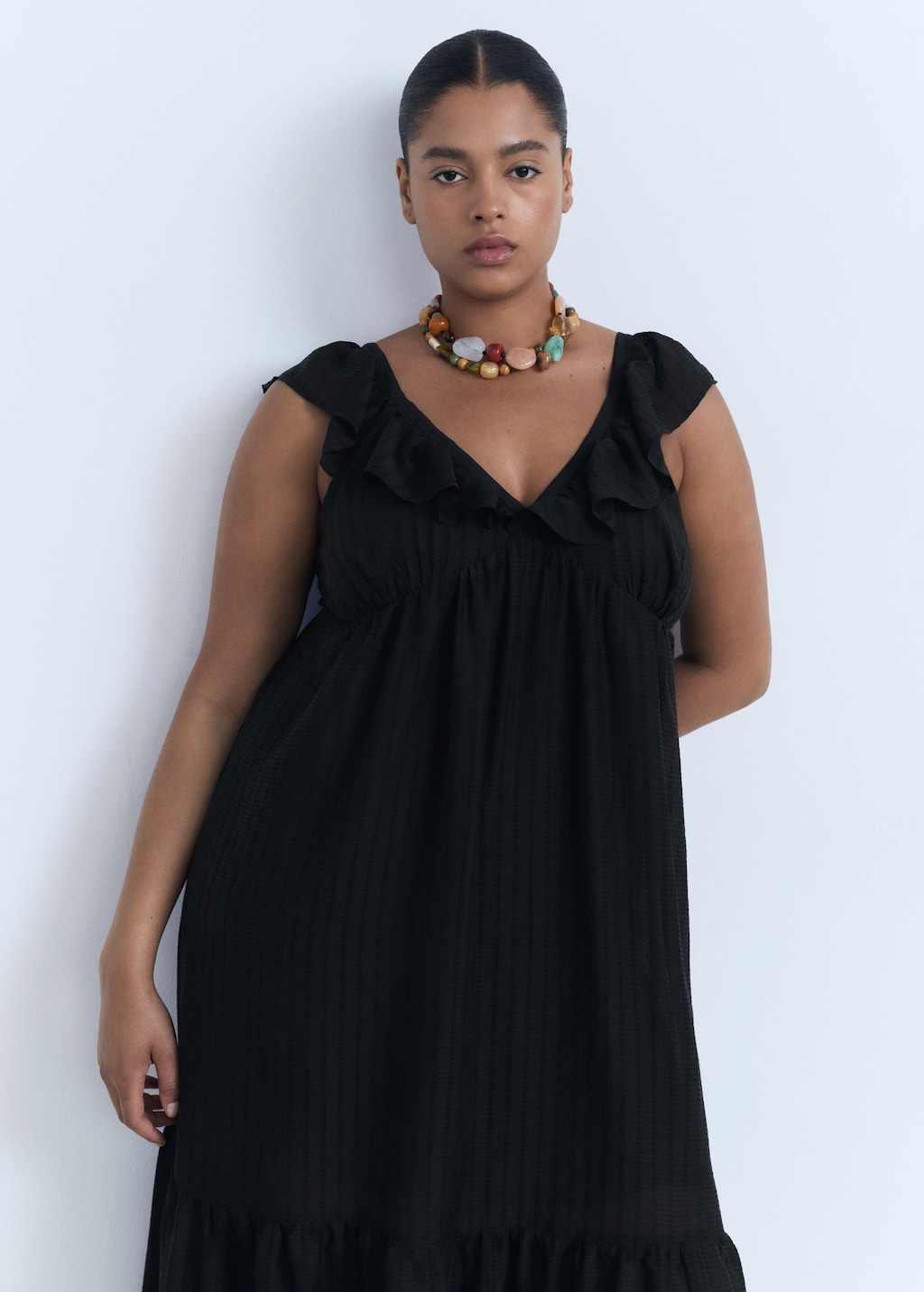 Long dress with ruffle neckline