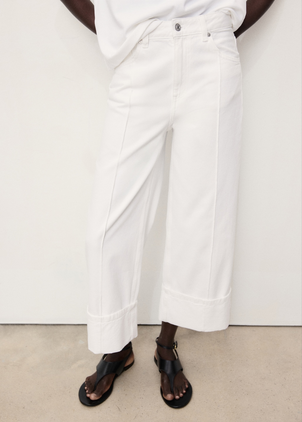 Wide leg cropped jeans with rolled-up hem