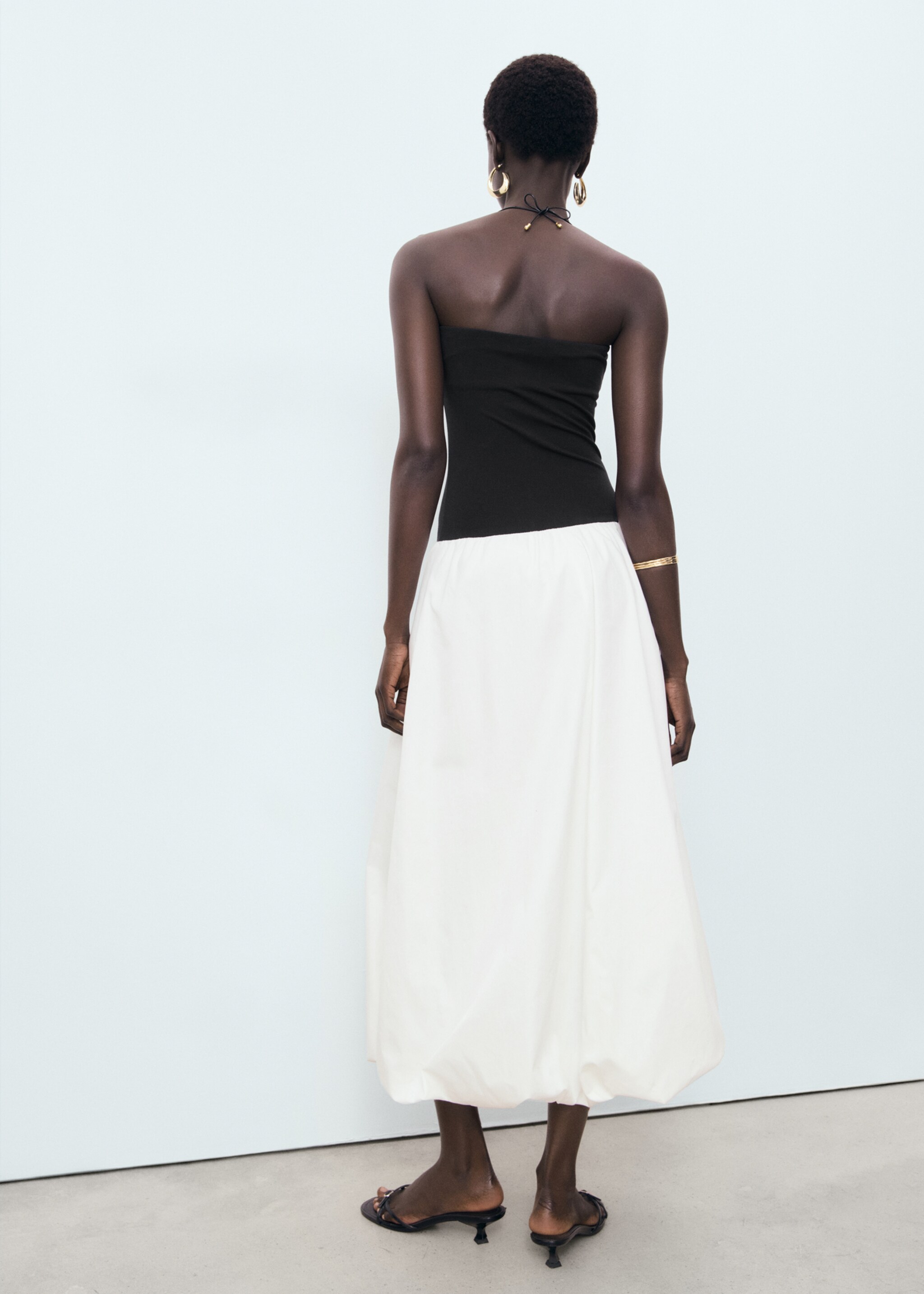 Combined knitted balloon dress - Reverse of the article