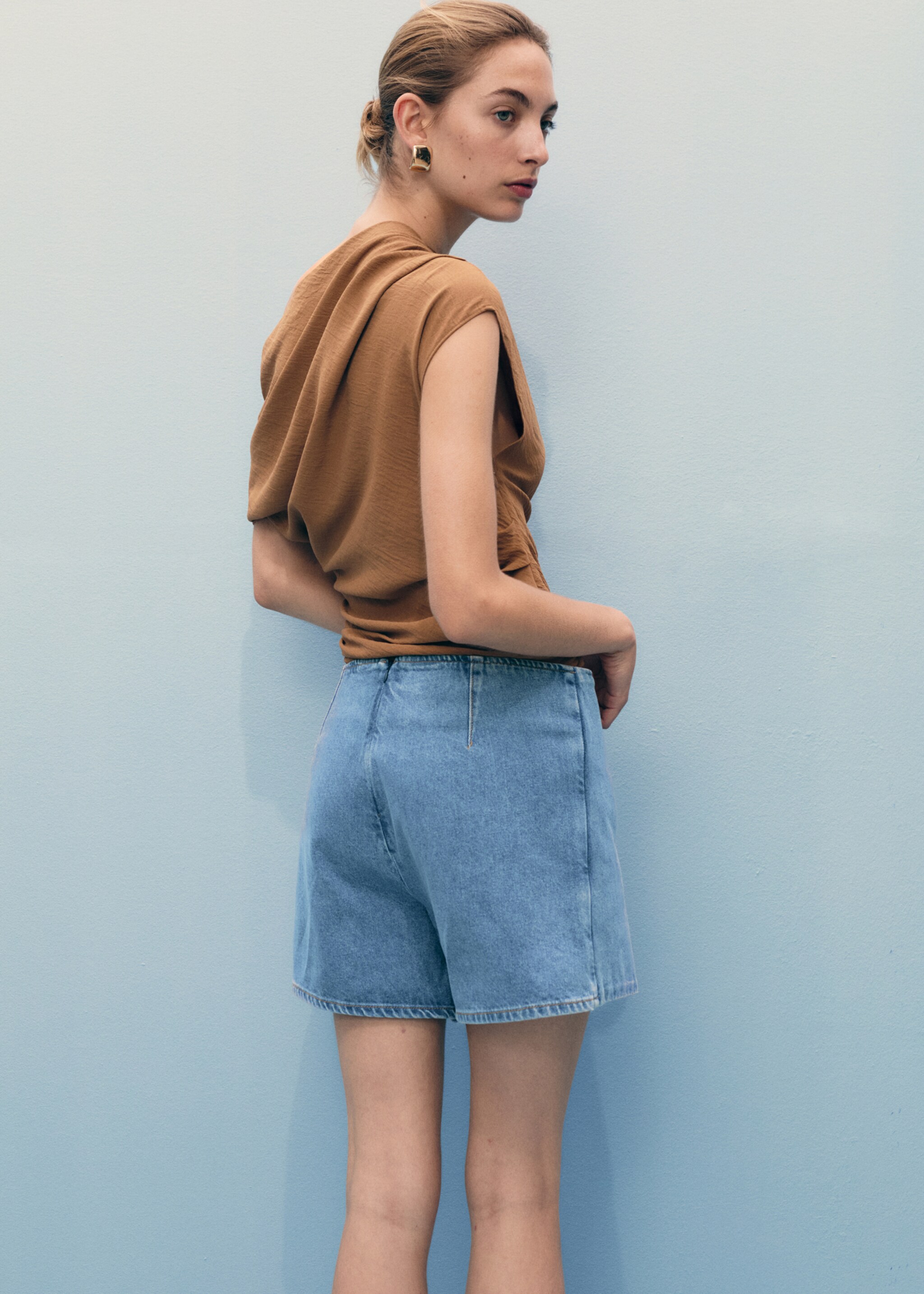 Überschlagene Denim-Rockhose - Rückseite des Artikels