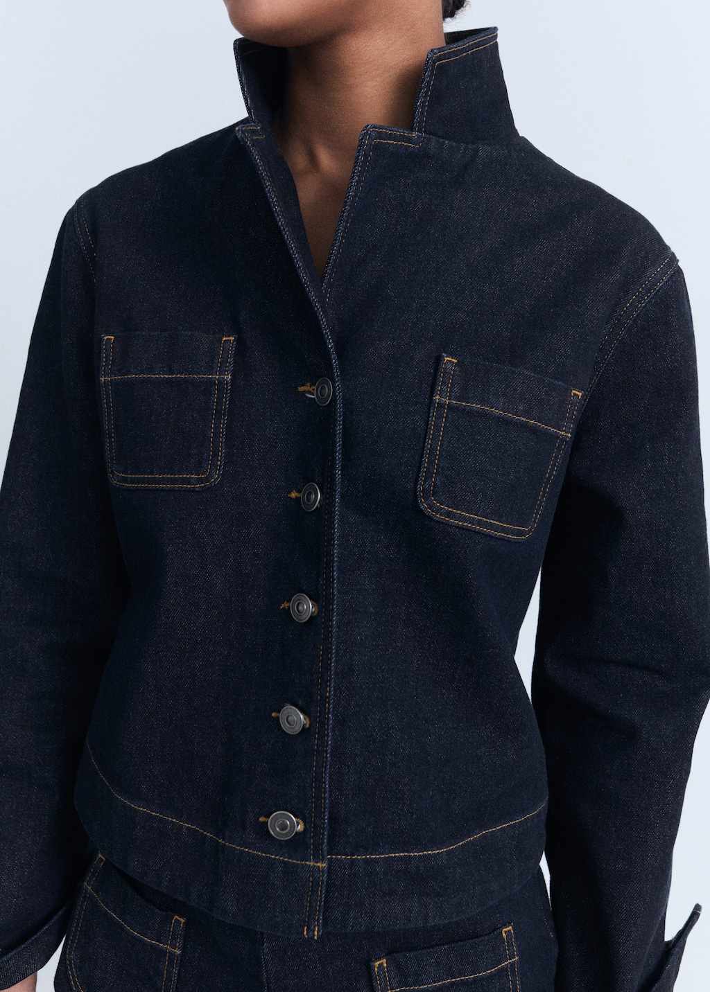 Fitted denim jacket with pockets