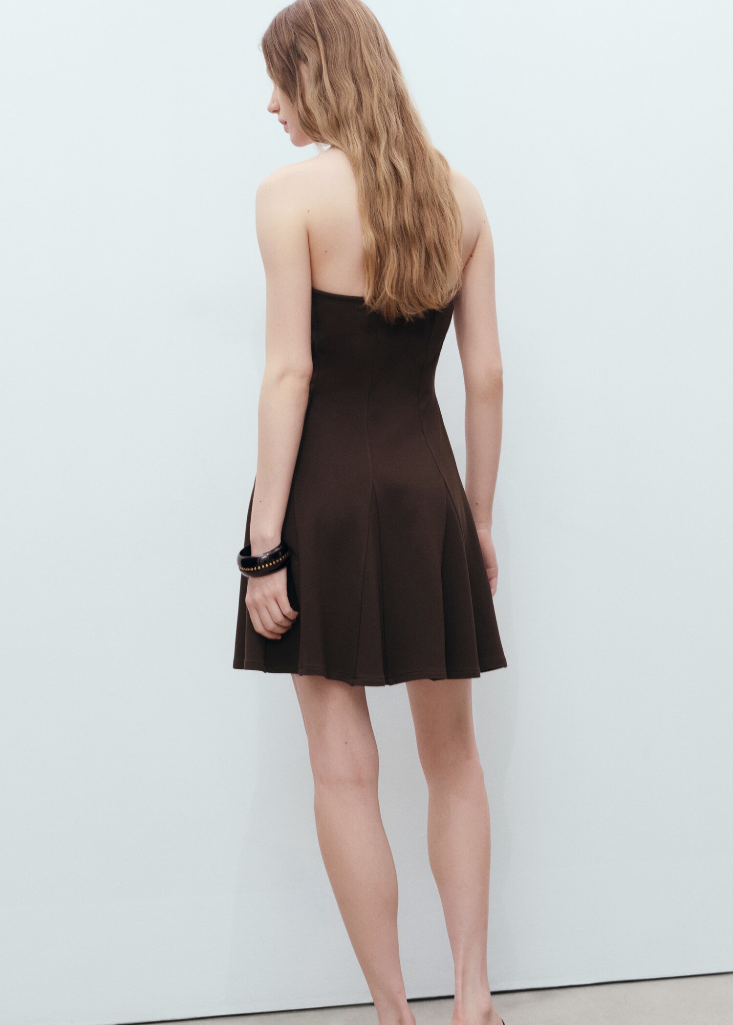 Robe bustier courte à plis plats - Verso de l’article